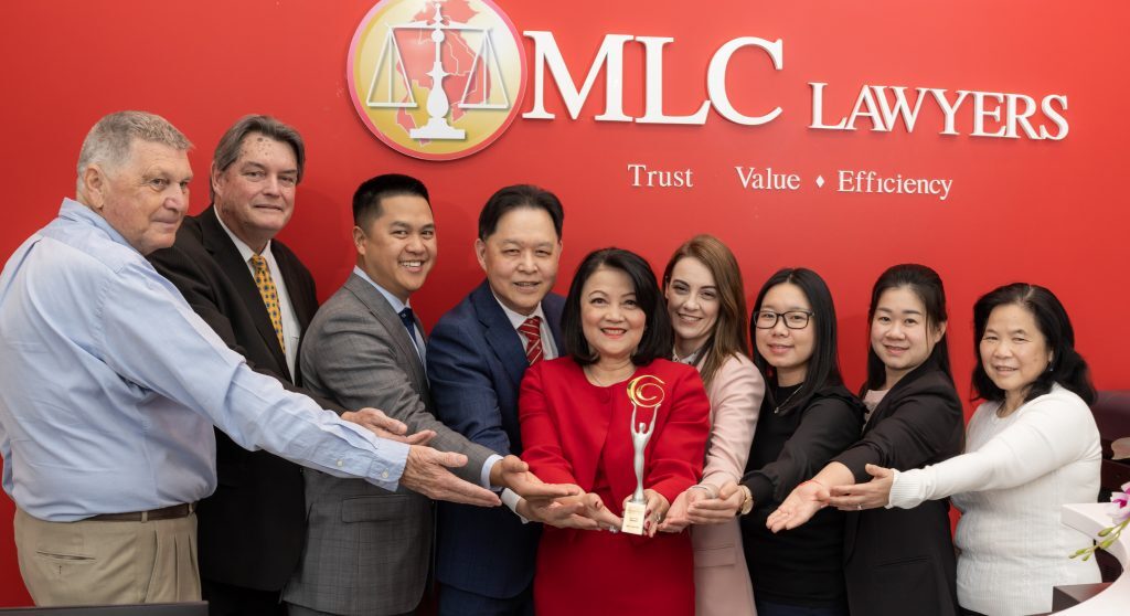 MLC Layers celebrating an award win